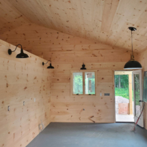 inside small house with wooden walls