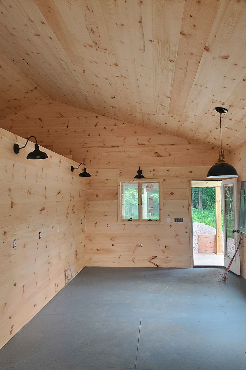 inside small house with wooden walls