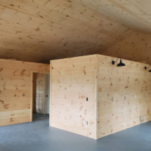 new house with pine wooden walls built by mountain spring builders