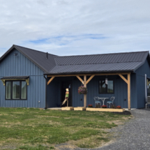 blue house built by Mountain Spring Builders